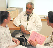 Bernett Johnson, MD, with patient and student
